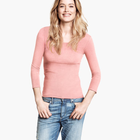 Imagem do conjunto de camisa rosa claro com calça jeans