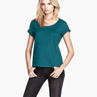 Imagem do conjunto de blusa verde escura com jeans preto